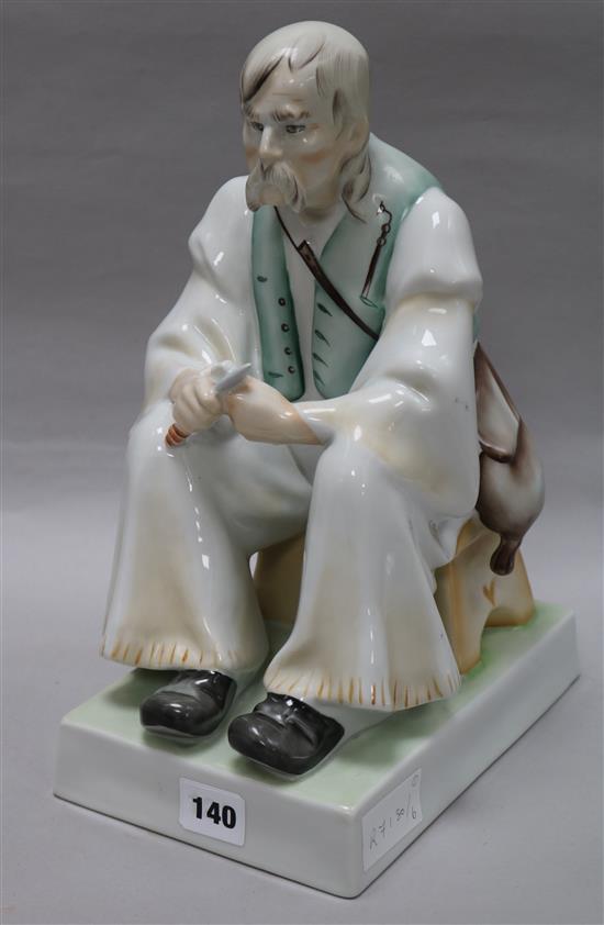 A Zsolnay ceramic figure of a gentleman, seated height 35cm